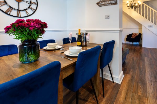 dining table with blue chairs